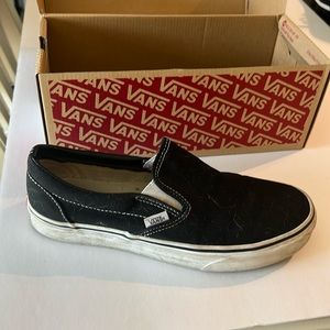 Black and white slip on vans